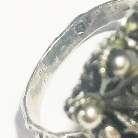 Victorian silver ring with garnet details