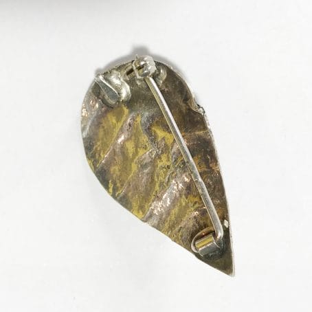 modernist brooch in silver with natural retro amber