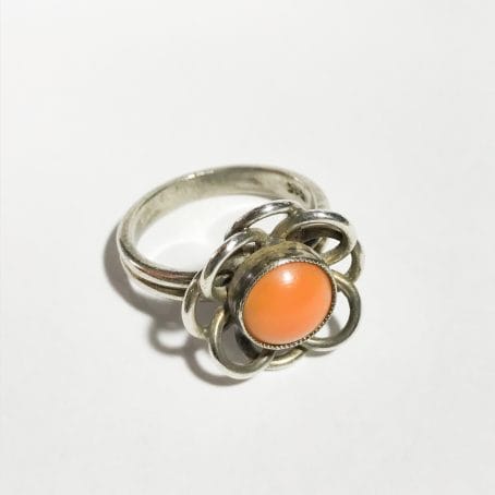 ring with coral corolla