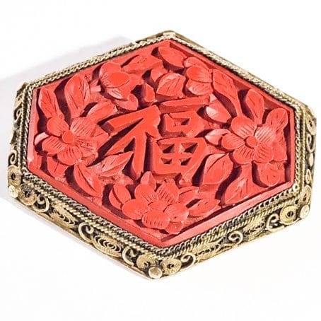 Chinese luck brooch in silver and lacquer