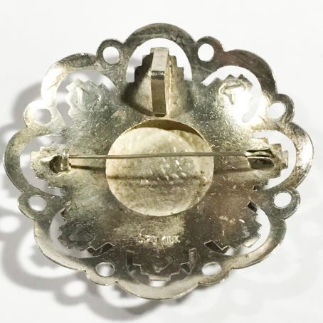 spilla vintage in argento con figura inca dettagli