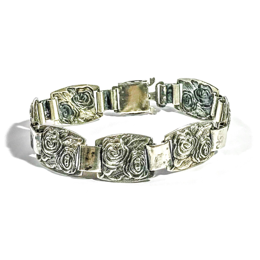 silver art deco bracelet with floral bas-reliefs