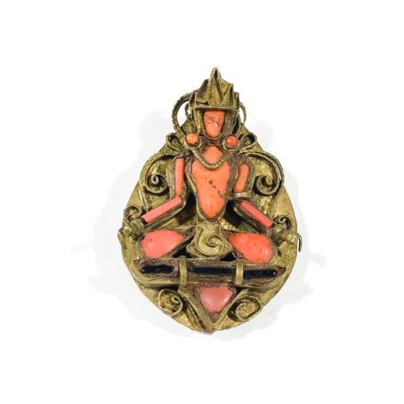 ancient Indian gao mounted on a brooch