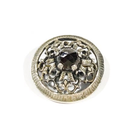 antique solid silver brooch with garnet