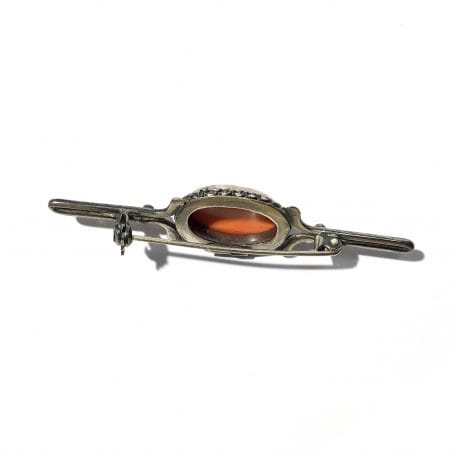 solid silver brooch with coral