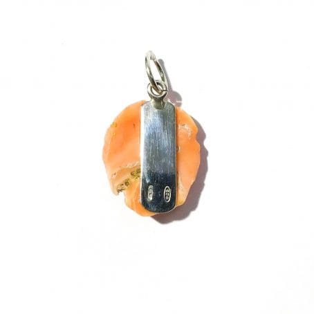 coral mask pendant