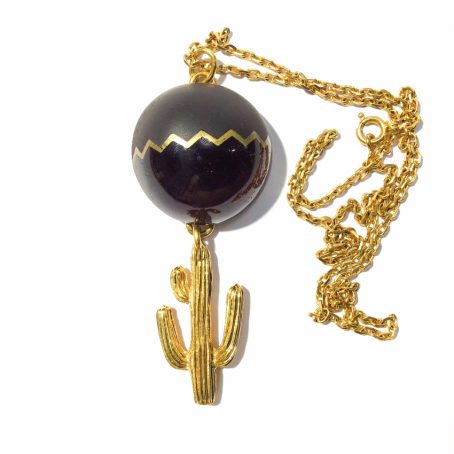 cactus Daum pendant by Hilton McConnico