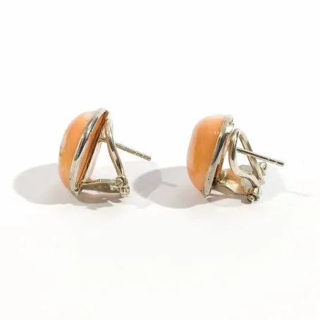 detail of Italian earrings with pink pacific coral