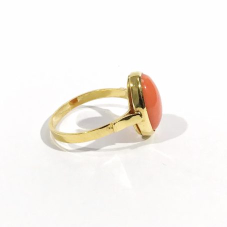 detail golden silver and pink coral ring