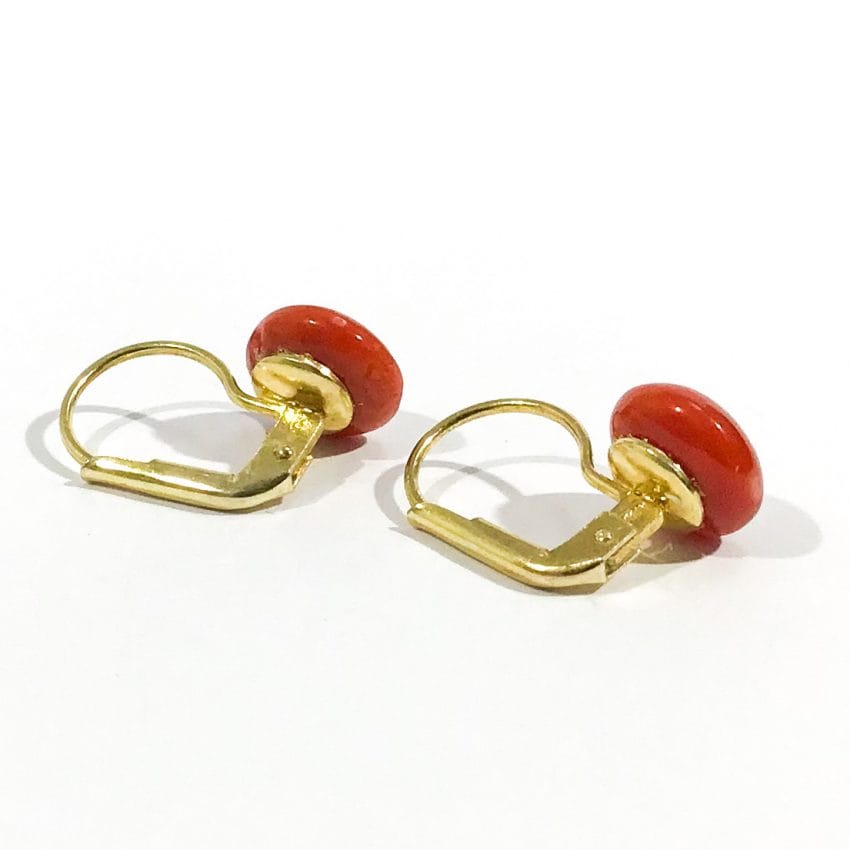 golden leverback earrings detail with red coral