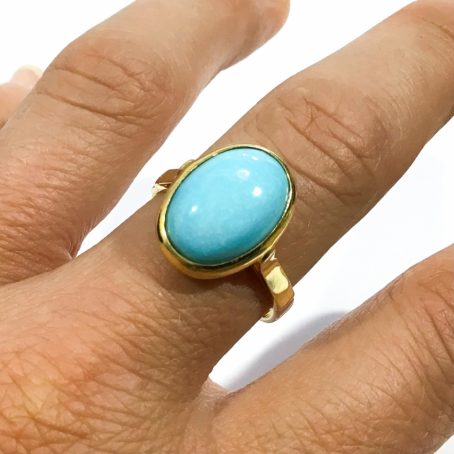 golden silver ring and natural turquoise