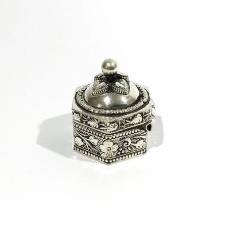 solid silver ethnic pillbox with floral decorations, hallmarked 