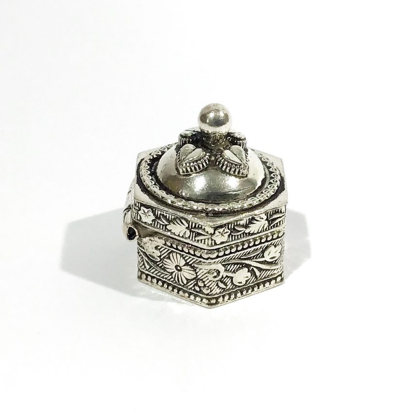 vintage silver ethnic pill box with floral decorations