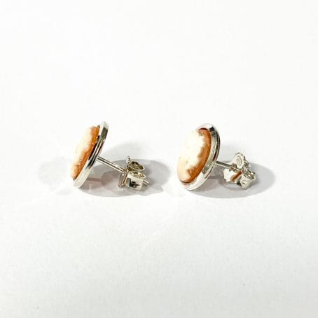 detail of lobe earrings with cameo