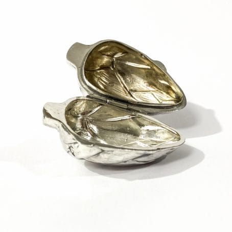 tablet holder in the shape of an open artichoke
