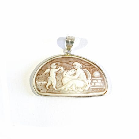 cameo pendant with romantic scene