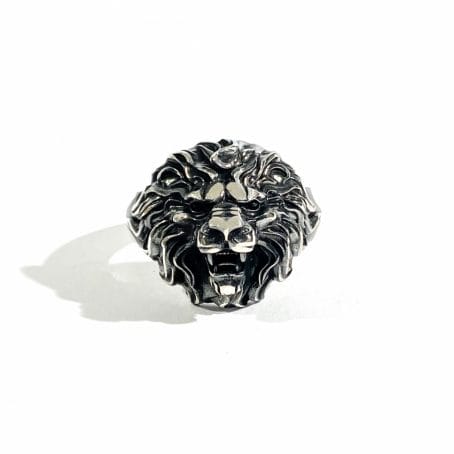 silver men's ring with lion head