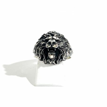 silver men's ring with lion head