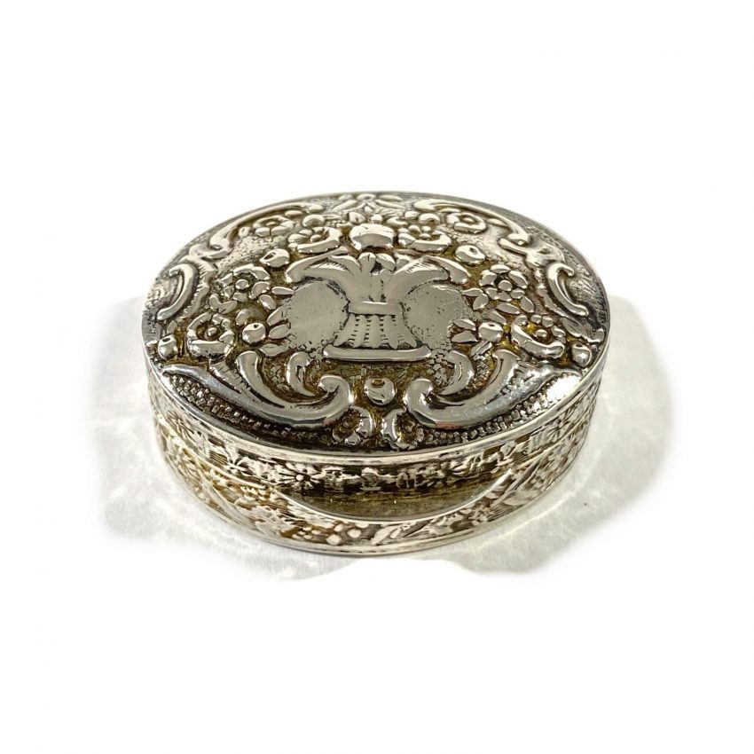 Embossed silver pill box